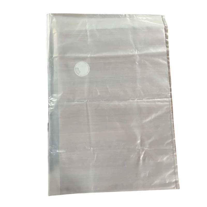 A clear plastic DustekJR-31 collection bag.